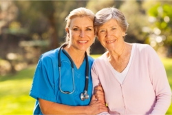 nurse and old woman smiling